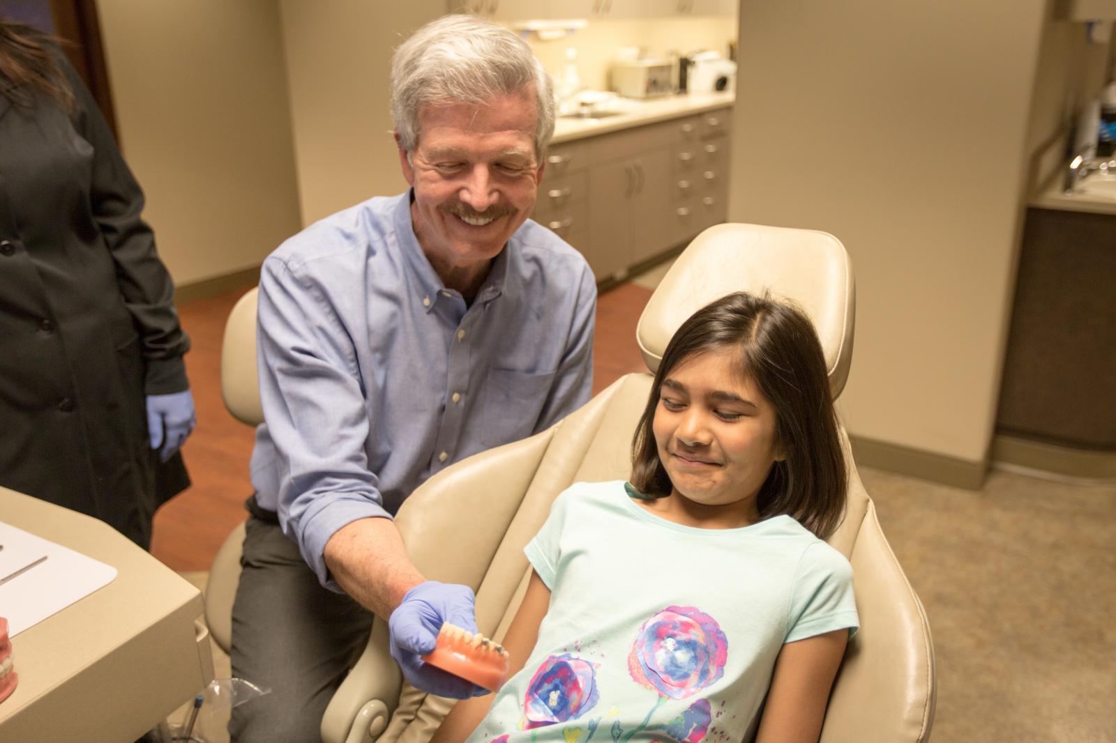 Tim and young girl at observation appointment